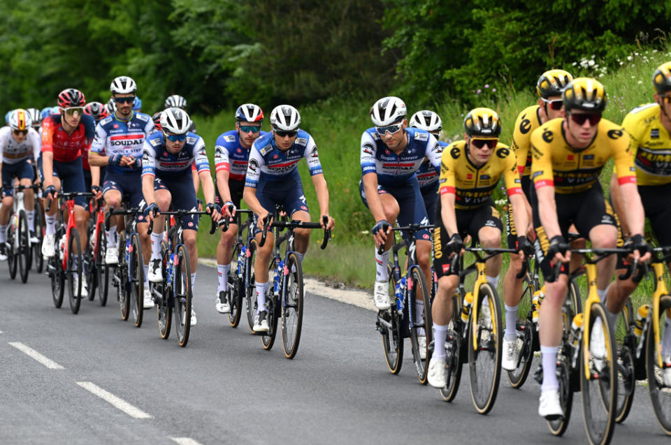 LA CHAISEDIEU FRANCE  JUNE 05 LR Rmi Cavagna of France Mauri Vansevenant of Belgium and Ethan Vernon of The United Kingdom and Team Soudal  Quick Step compete during the 75th Criterium du Dauphine 2023 Stage 2 a 1673km stage from BrassaclesMines to La ChaiseDieu 1080m  UCIWT  on June 05 2023 in La ChaiseDieu France Photo by Dario BelingheriGetty Images