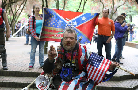 A conservative protester yells during competing demonstrations in Portland, Oregon, U.S. June 4, 2017. REUTERS/Jim Urquhart