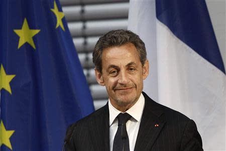 Former French President Nicolas Sarkozy pauses during his speech at an event hosted by the Konrad-Adenauer foundation in Berlin February 28, 2014. REUTERS/Tobias Schwarz