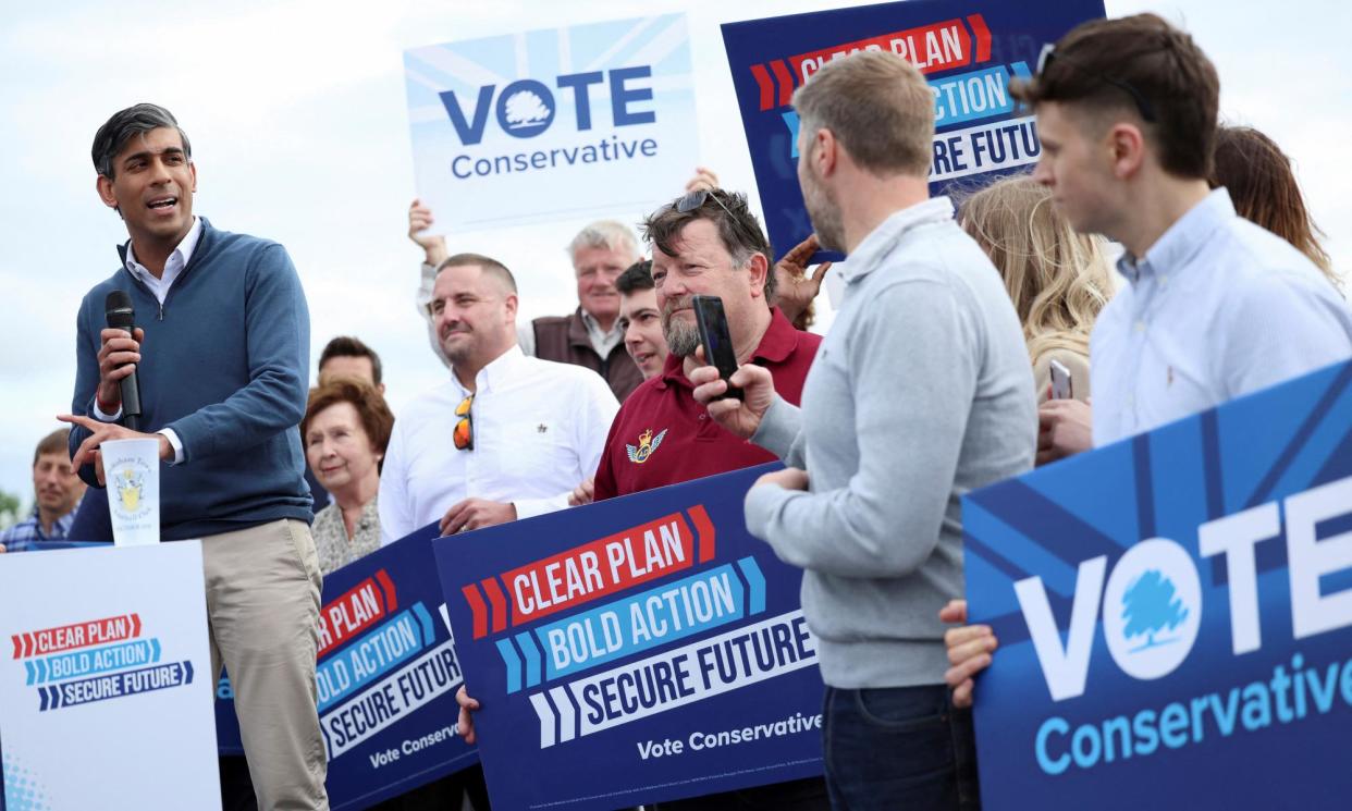 <span>British Prime Minister Rishi Sunak speaks during a visit for the Conservative general election campaign event in Melksham, England.</span><span>Photograph: Phil Noble/AP</span>