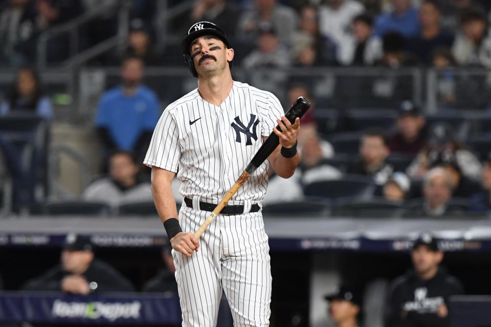 Oct 22, 2022; Bronx, New York, USA; New York Yankees designated hitter Matt Carpenter (24) strikes out in the seventh inning against the Houston Astros during game three of the ALCS for the 2022 MLB Playoffs at Yankee Stadium. Mandatory Credit: Dennis Schneidler-USA TODAY Sports