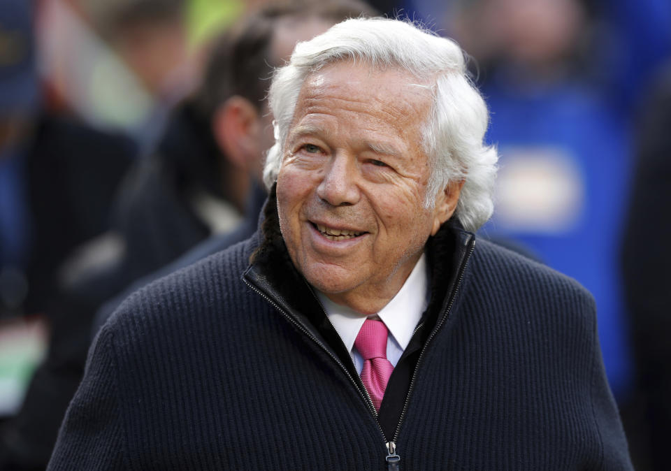 FILE - In this Jan. 20, 2019, file photo, New England Patriots owner Robert Kraft walks on the field before the AFC Championship NFL football game in Kansas City, Mo. The illicit massage parlor sting in Florida that ensnared Kraft is a reminder of how challenging it’s been to crackdown on underground prostitution operations. (AP Photo/Charlie Neibergall, File)