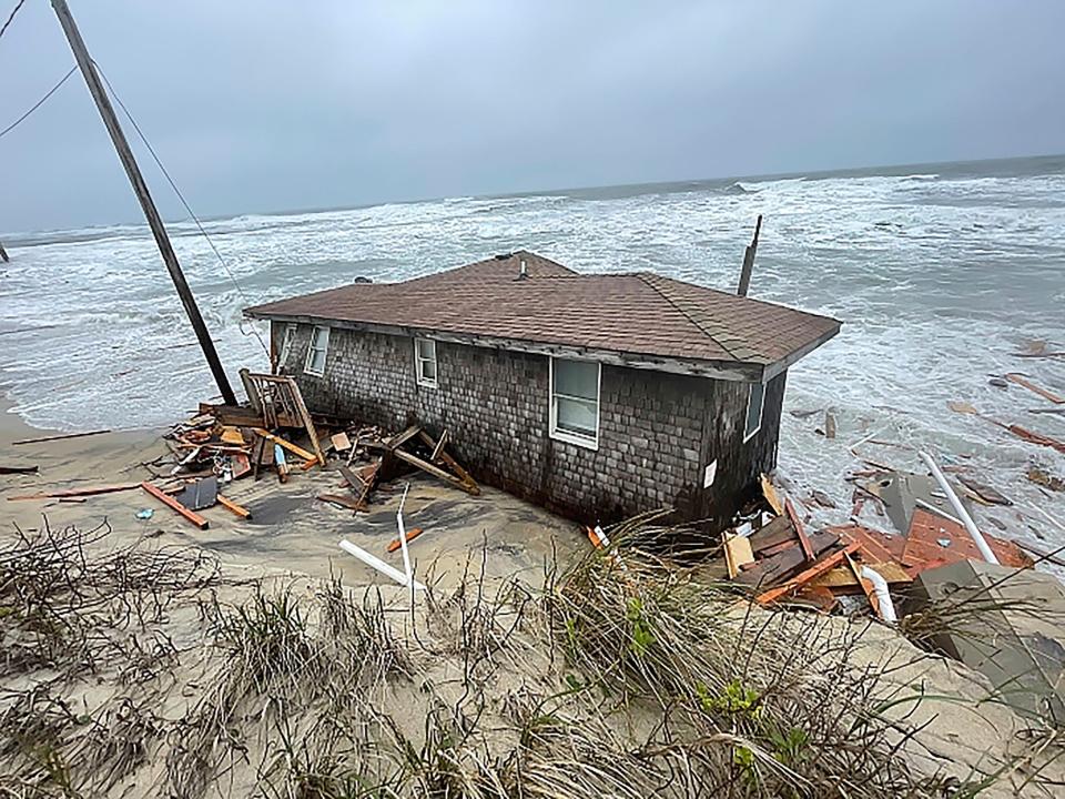 A collapsed one-story house in Rodanthe in 2023.