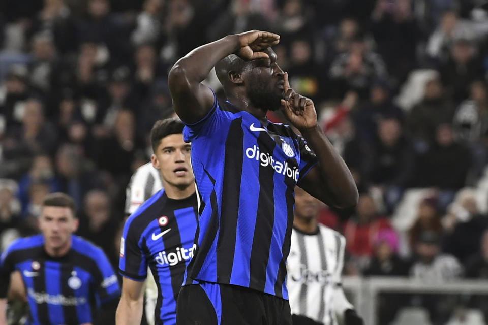 FILE - Inter Milan's Romelu Lukaku gestures towards Juventus fans after scoring a goal in a Italian cup semi final first leg soccer match between Juventus and Inter Milan, at the Allianz Stadium, in Turin, Italy, Tuesday, April 4, 2023. Lukaku's silencing gesture toward Juventus fans who abused him in an Italian Cup game led to a second yellow card and being sent off the field. Lukaku's one-game ban was eventually overturned by the Italian soccer federation. (Fabio Ferrari/LaPresse via AP, File)