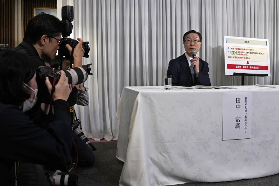 Tomihiro Tanaka, right, President of Family Federation for World Peace and Unification, speaks during a press conference Tuesday, Nov. 7, 2023, in Tokyo. The church has criticized the Japanese government’s request for a court order to dissolve the group, saying it’s based on groundless accusations and is a serious threat to religious freedom and human rights of its followers. Japan’s Education Ministry last month asked the Tokyo District Court to revoke the legal status of the Unification Church after a ministry investigation concluded the group for decades has systematically manipulated its followers into donating money, sowing fear and harming their families.(AP Photo/Shuji Kajiyama)