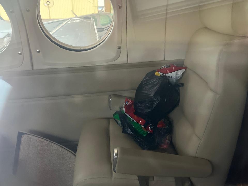 Snacks rest on a seat inside the Beechcraft jet that landed at Dona Ana County International Jetport in Santa Teresa, New Mexico on Thursday, July 25, 2024, with Ismael "El Mayo" Zambada on board.