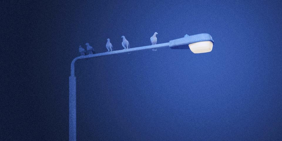 An animated gif showing a streetlight turning from white to purple.