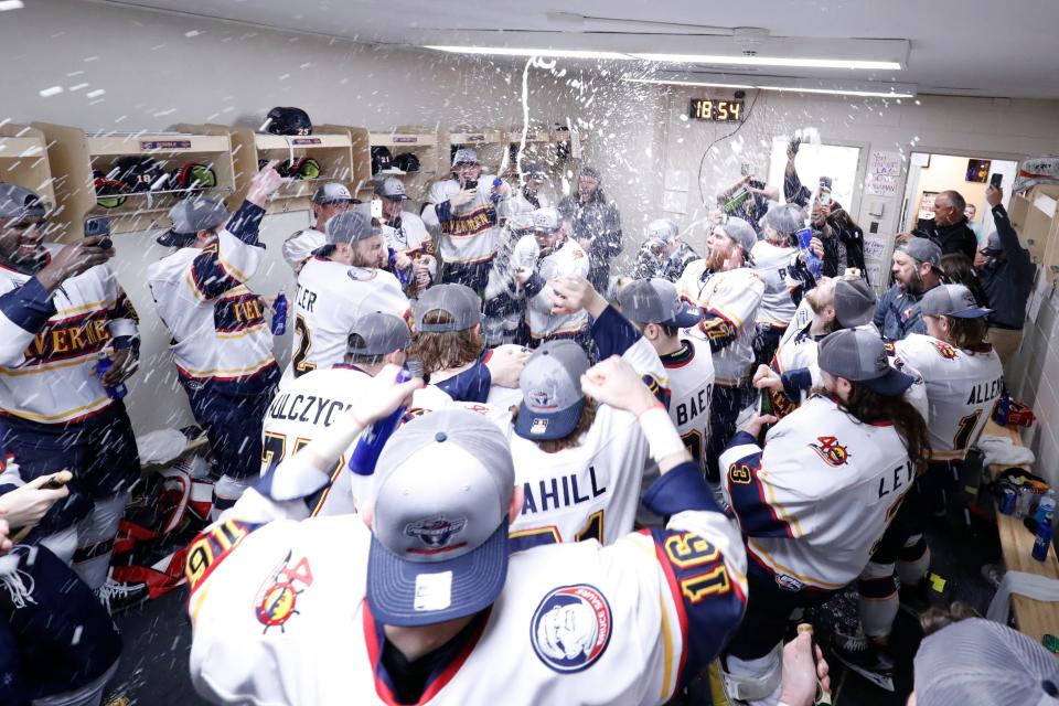 The Peoria Rivermen celebrate their SPHL President's Cup championship in the locker room at Berglund Center after clinching the series over Roanoke in Game 4 on May 3, 2022.