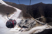 FILE - The Yanqing National Alpine Skiing Center, which host alpine skiing competition during the upcoming 2022 Beijing Winter Olympics, is seen during a media tour of Olympic venues in Yanqing on the outskirts of Beijing, Friday, Feb. 5, 2021. The dearth of candidates to host the Winter Olympics amid spiraling venue costs could force the IOC to resort to lining up a list of fixed, rotating hosts. A highly theoretical list could include Salt Lake City and Vancouver in North America, Pyeongchang in Asia and places like Switzerland, Italy and Scandinavia in Europe. (AP Photo/Mark Schiefelbein, File)