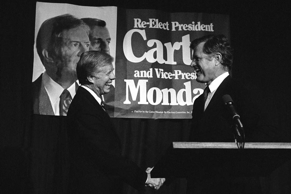 President Jimmy Carter, left, meets his former rival for the Democratic nomination, Sen. Edward Kennedy, D-Mass., in Los Angeles in 1980. (Photo: AP)