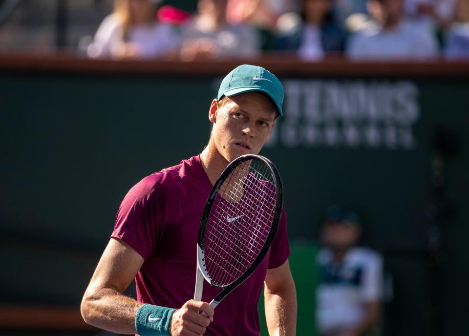 Jannik Sinner of Italy reacts to a point against Taylor Fritz of the United States during their quarterfinal match at the BNP Paribas Open at the Indian Wells Tennis Garden in Indian Wells, Calif., Thursday, March 16, 2023. 