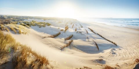 Peniche offers a beautiful beach and big waves - Credit: GETTY