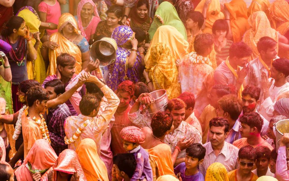 <p>People around the world get together to celebrate the Hindu holiday of Holi, or “The Festival of Colors,” which marks the beginning of spring. One of the most fun activities is tossing colored powered onto everyone in sight, resulting in a human color wheel.</p>