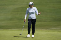 Jin Young Ko waves to fans after sinking a putt on the first green during the second round of LPGA's DIO Implant LA Open golf tournament at Wilshire Country Club on Friday, April 22, 2022, in Los Angeles. (AP Photo/Ashley Landis)
