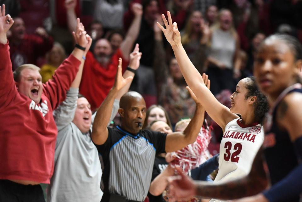 Alabama guard Aaliyah Nye celebrates a 3-point shot during the Crimson Tide's 67-61 win over Auburn on Feb. 18. Alabama finished fourth in the SEC and qualified for the NCAA Tournament as an at-large team.