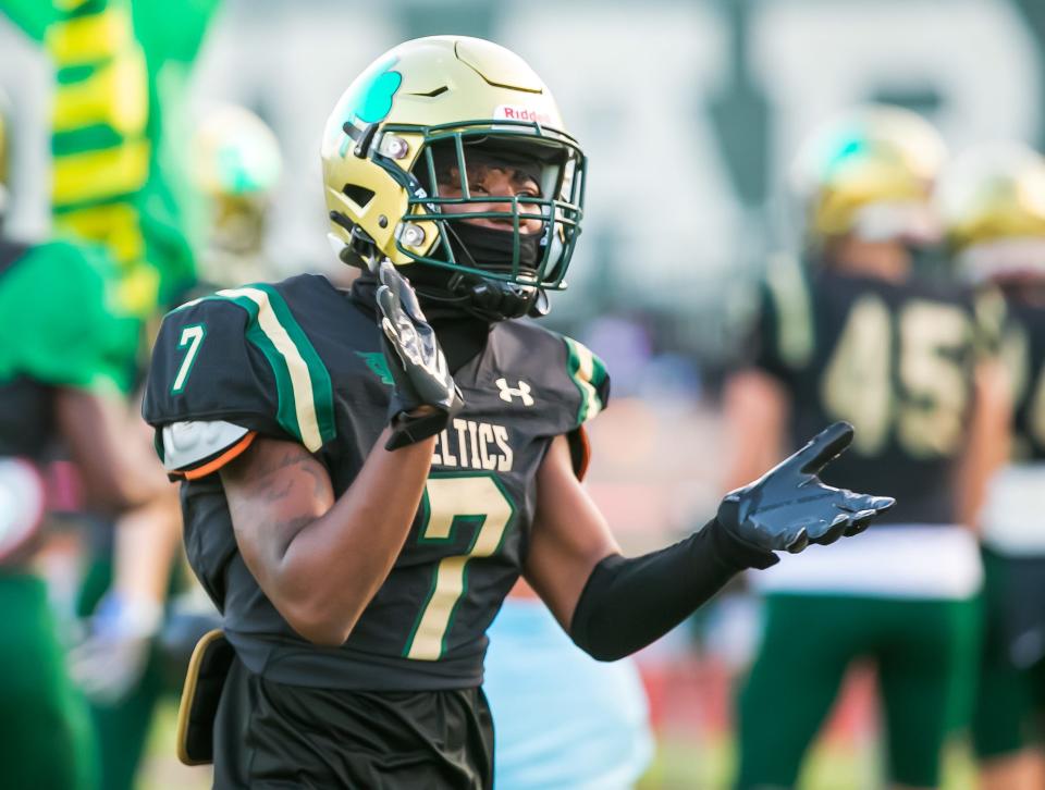 Trinity Catholic Jamarkus Starkes (7) storms the field as Raines travels to Trinity Catholic Friday, Sept. 23, 2022, in Ocala, [Alan Youngblood/Special to the Gainesville Sun]