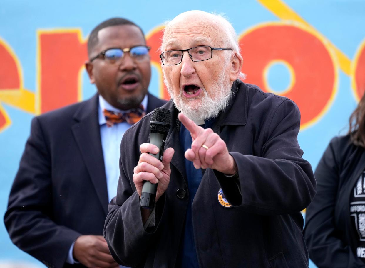 The Rev. Joseph Ellwanger speaks as part of the Souls to the Polls at Midtown Shopping Center on West Capitol Drive in Milwaukee, on Sunday, Oct. 30, 2022. Souls to the Polls Sunday is a  historically energized day across the nation for congregations of Black churches to vote early together.