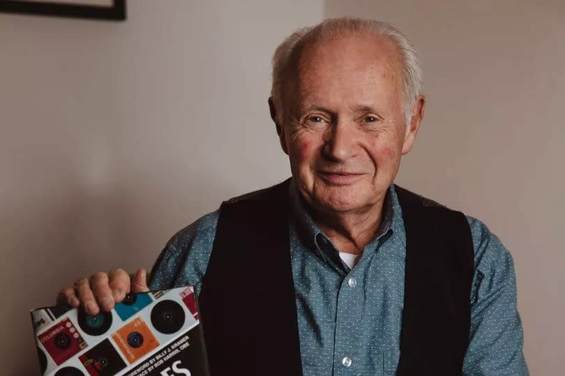 Author and former custodian of John Lennon's childhood home Colin Hall, from Woolton, pictured with his second book The Songs The Beatles Gave Away