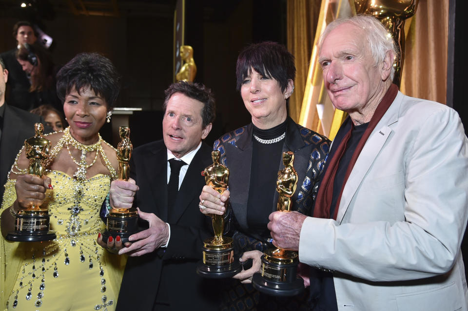 Euzhan Palcy, from left, Michael J. Fox, Diane Warren and Peter Weir pose for photos during the Governors Awards on Saturday, Nov. 19, 2022, at Fairmont Century Plaza in Los Angeles. (Photo by Richard Shotwell/Invision/AP)