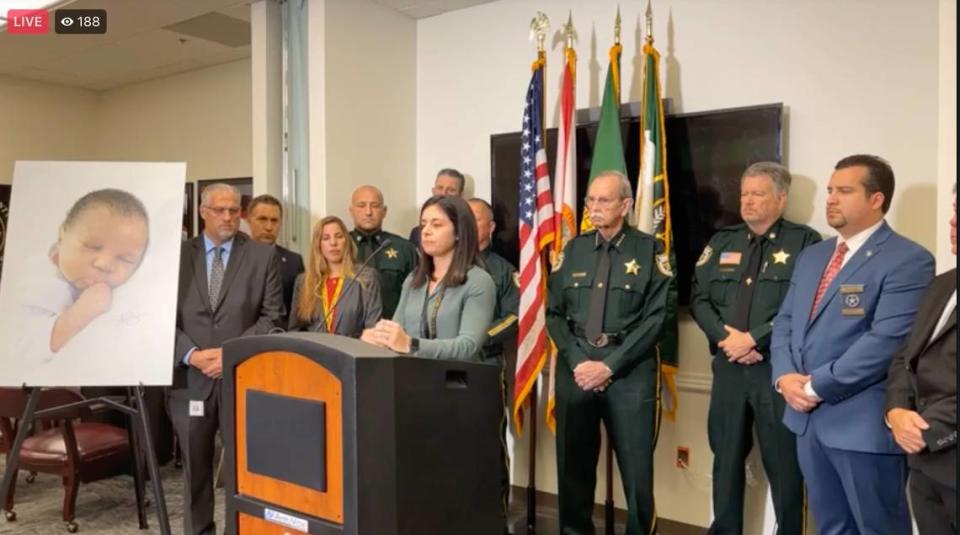 Palm Beach County Sheriff’s Office deputies, including investigator Brittany Christofell (at lectern), discuss the arrest of a mother on Dec. 15, 2022, four years after her newborn baby girl was found floating in Boynton Beach Inlet on June 1, 2018. This is a screen grab from a live-streamed press conference on Facebook.