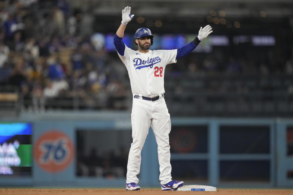 Los Angeles Dodgers designated hitter J.D. Martinez (28) celebrates after a double during the third inning of a baseball game against the San Francisco Giants in Los Angeles, Saturday, Sept. 23, 2023. Mookie Betts and Max Muncy scored. (AP Photo/Ashley Landis)