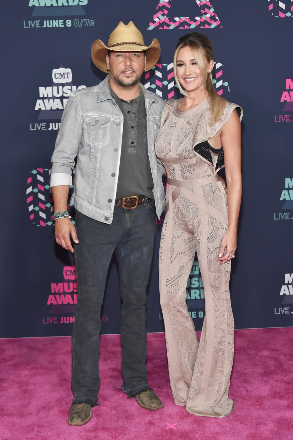 Jason Aldean in a cowboy hat with wife Brittany Kerr 