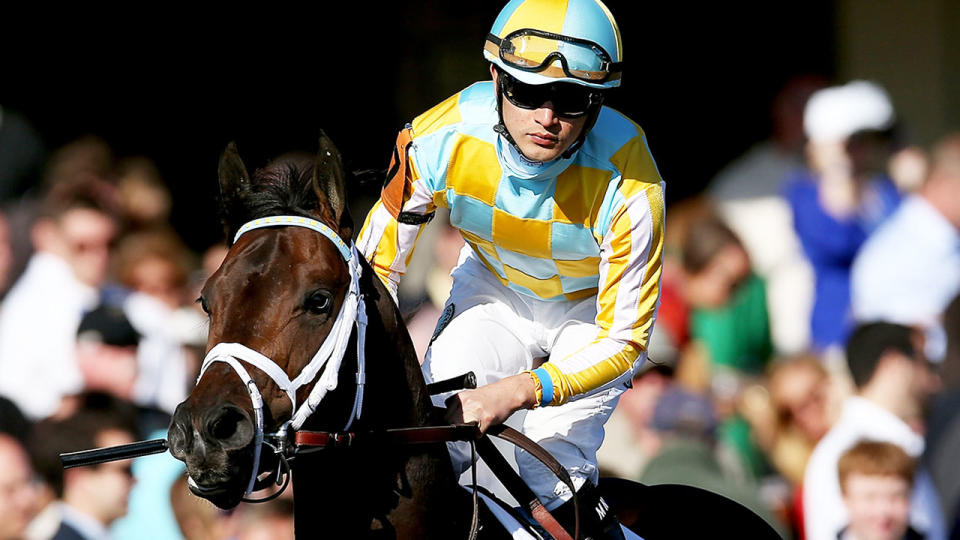 Miguel Mena, pictured here riding Uncaptured in the Toyota Blue Grass Stakes in 2013.