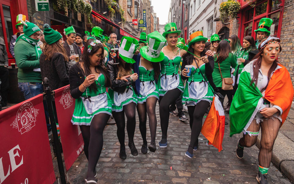 Five Brazilian girls dancing at Temple Bar after the parade in Dublin, Ireland.