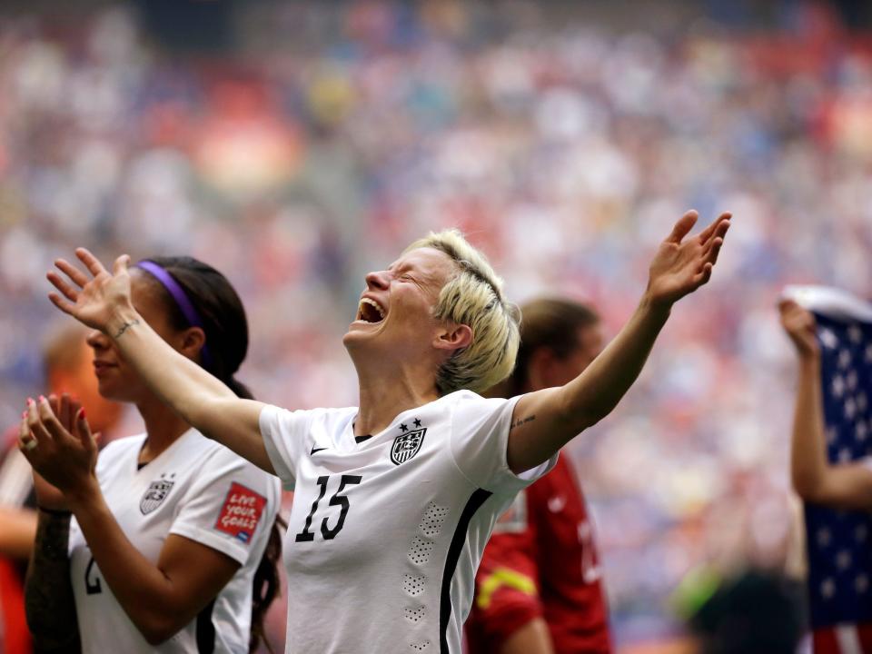 Megan Rapinoe celebrates the USWNT's 2015 World Cup victory.