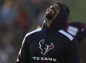 Houston Texans running back Arian Foster laughs during NFL football training camp Monday, July 28, 2014, in Houston. (AP Photo/Pat Sullivan)