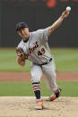 Detroit Tigers starting pitcher Derek Holland delivers during the first inning of the team's baseball game against the Cleveland Indians, Friday, April 9, 2021, in Cleveland. (AP Photo/Tony Dejak)