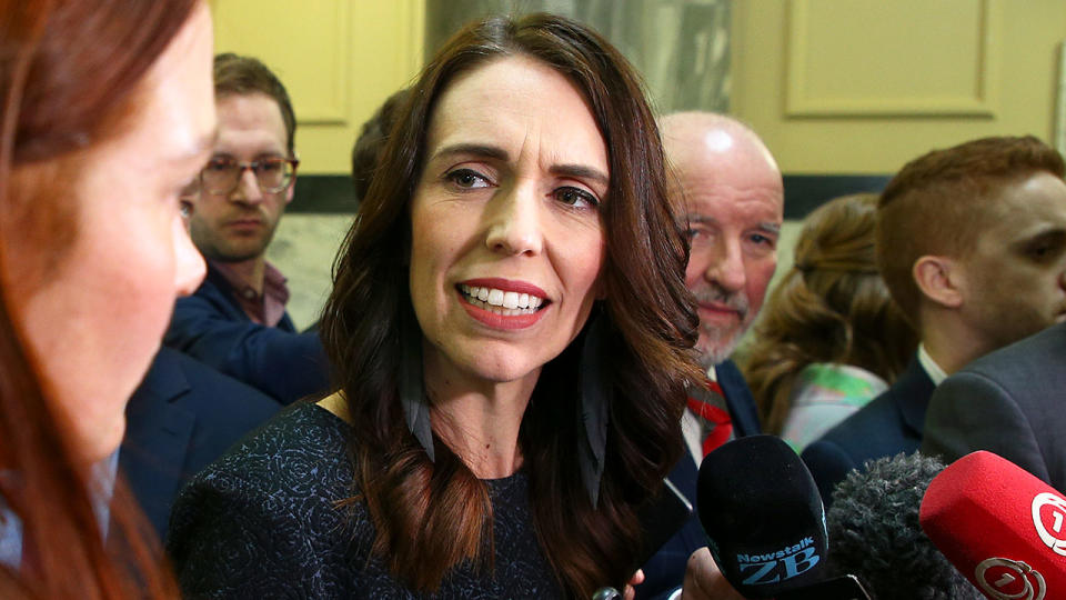 Pictured here, New Zealand PM Jacinda Ardern addresses members of the media.