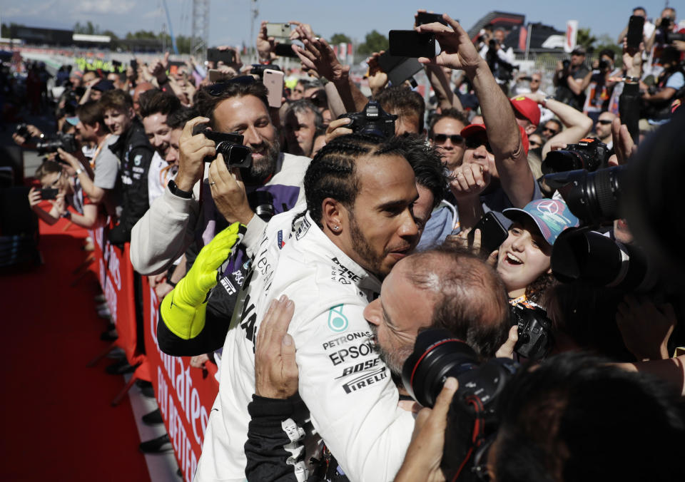 Mercedes driver Lewis Hamilton of Britain celebrates after winning the Spanish Formula One race at the Barcelona Catalunya racetrack in Montmelo, just outside Barcelona, Spain, Sunday, May 12, 2019. (AP Photo/Emilio Morenatti)