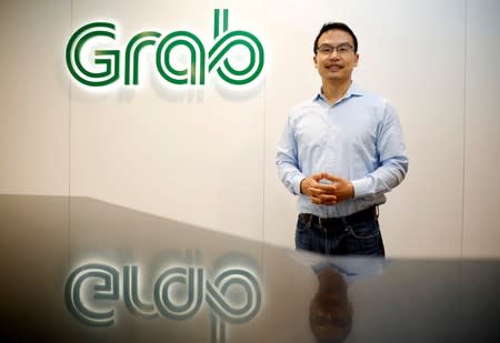 Grab's President Ming Maa poses before an interview with Reuters in Singapore