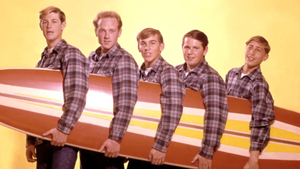 Wilson, pictured far left, was a founding member of The Beach Boys. - Michael Ochs Archives/Getty Images
