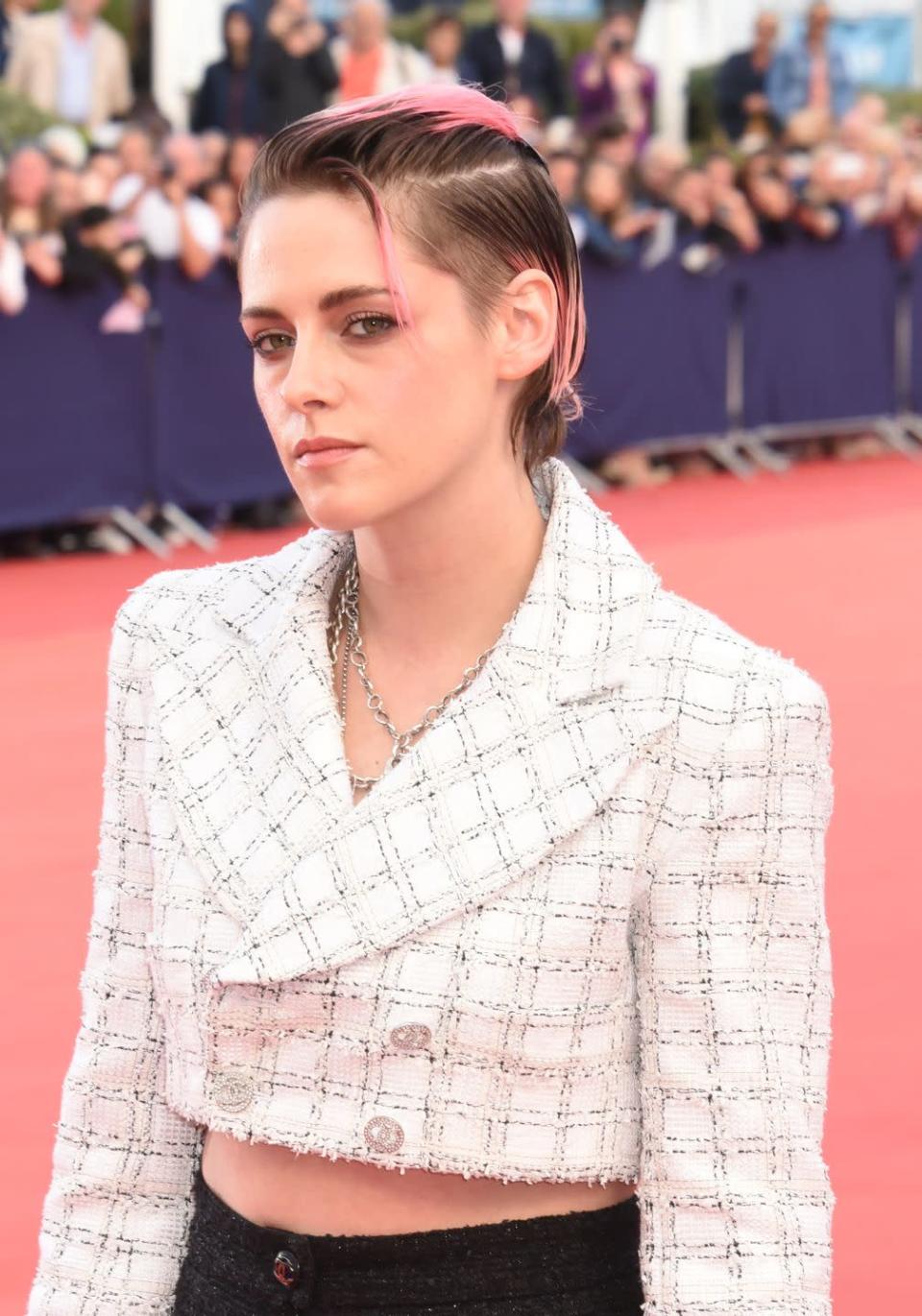 <p>Chanel cool girl Kristen Stewart gave her pixie crop a pink twist.</p>