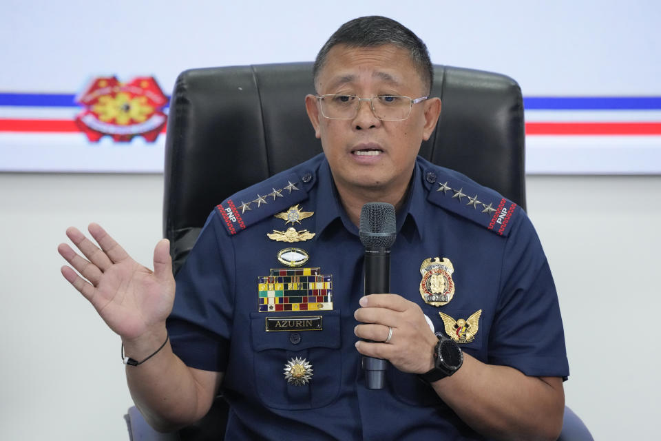 Philippine Police Chief, Police General Rodolfo Azurin Jr., gestures during a news conference at Camp Crame police headquarters, Thursday, Jan. 5, 2023, in Metro Manila, Philippines. The Philippine national police chief said Thursday he has offered to resign to encourage nearly a thousand other top police officials to do the same to regain public trust after some enforcers were arrested due to illegal drugs and further tainted the police force's notorious image. (AP Photo/Aaron Favila)