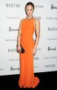 Emily Blunt was -- without a doubt -- the best-dressed celeb in attendance at last week's Women of the Year Awards, which were held at Claridge's hotel in London. Upon arriving at the fete, the actress posed for photographers in her tangerine-hued Alexander McQueen halterneck dress (complete with bedazzled neckline), while carrying a black satin McQueen clutch. (10/31/2012)