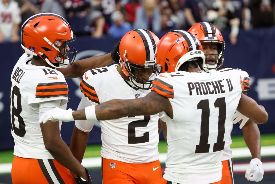 Dec 24, 2023; Houston, Texas, USA ;Cleveland Browns wide receiver James Proche II (11) and teammates celebrate wide receiver Amari Cooper (2) reception touchdown in the second quarter at NRG Stadium. Mandatory Credit: Thomas Shea-USA TODAY Sports