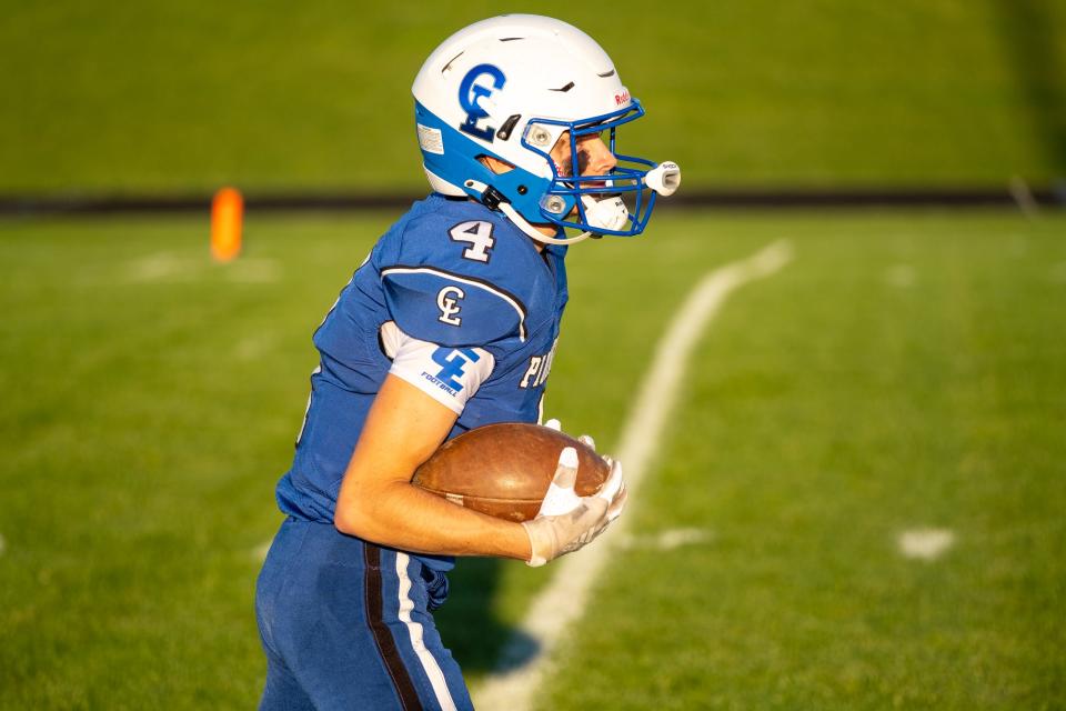 Croswell-Lexington wide receiver Nolan Moore warms up before a game last season. The Pioneers handled Saginaw Swan Valley, 34-7, in the season opener Thursday.