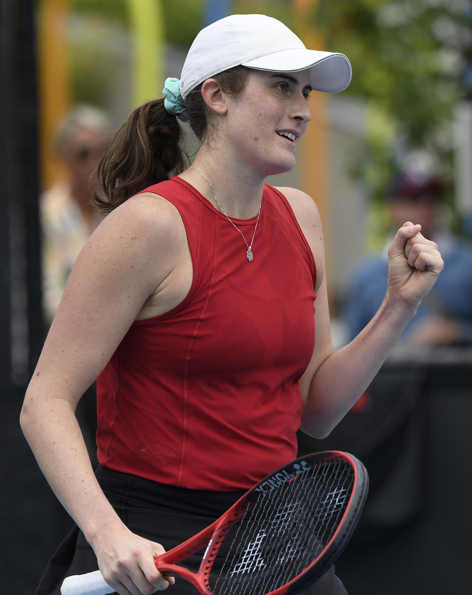 Canada's Rebecca Marino celebrates after defeating Australia's Kimberly Birrell in their first round match at the Australian Open tennis championship in Melbourne, Australia, Monday, Feb. 8, 2021.(AP Photo/Andy Brownbill)