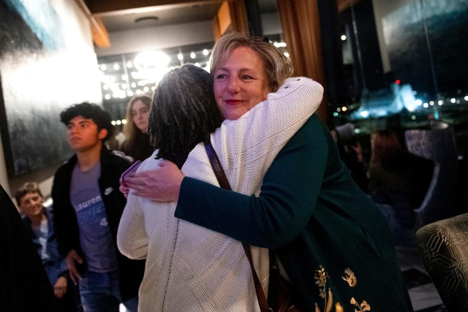District 4 City Councilmember Lauren Rider hugs a supporter Tuesday night at the Democratic election watch party at the Five Thirty Lounge in downtown Knoxville on Tuesday. Rider and the four other incumbents cruised to landslide wins over challengers who injected national Republican partisan politics into the ostensibly nonpartisan races.