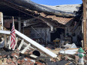 A saddle shop in downtown Sulphur, Okla., is shown on Monday, April 29, 2024. Tornadoes killed several people in Oklahoma, including an infant, and left thousands without power Sunday after a destructive outbreak of severe weather flattened buildings in the heart of one rural town and injured multiple people across the state. (AP Photo/Graham Brewer)
