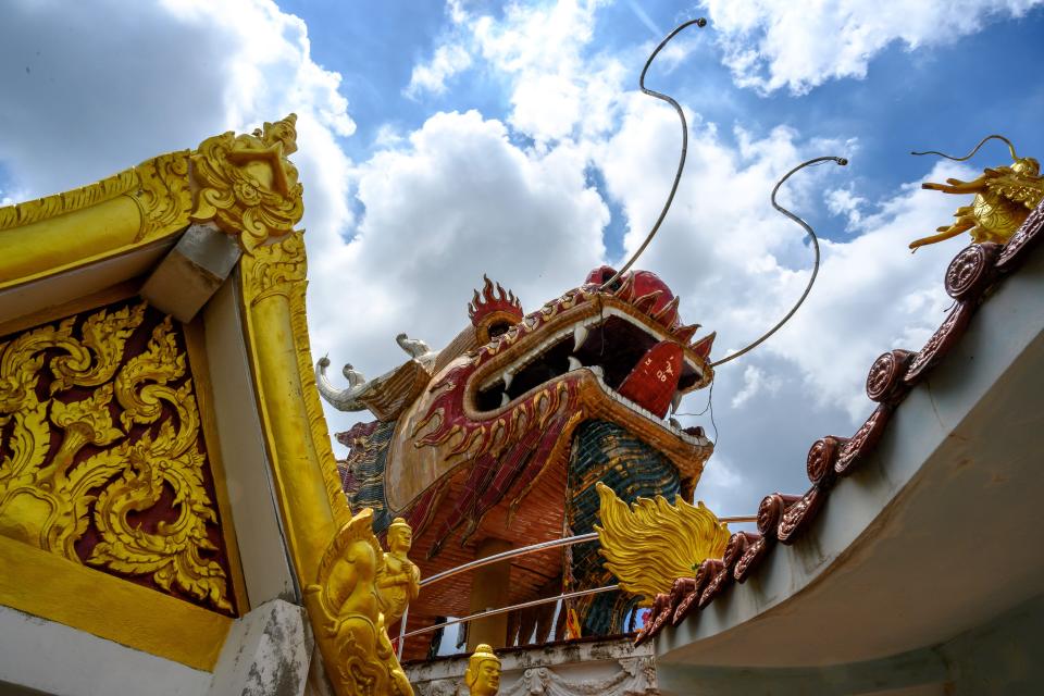 Side view of dragon from atop Wat Samphran Temple in Nakhon Pathom, Thailand.