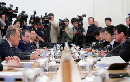 Russian Foreign Minister Sergei Lavrov (L) and his Japanese counterpart Taro Kono (R) attend a meeting in Moscow, Russia January 14, 2019. REUTERS/Maxim Shemetov