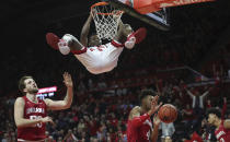 Rutgers guard Montez Mathis (23) hangs on the rim after this slam dunk during the first half of an NCAA college basketball game against Indiana, Wednesday, Jan. 15, 2020 in Piscataway, N.J. (Andrew Mills/NJ Advance Media via AP)