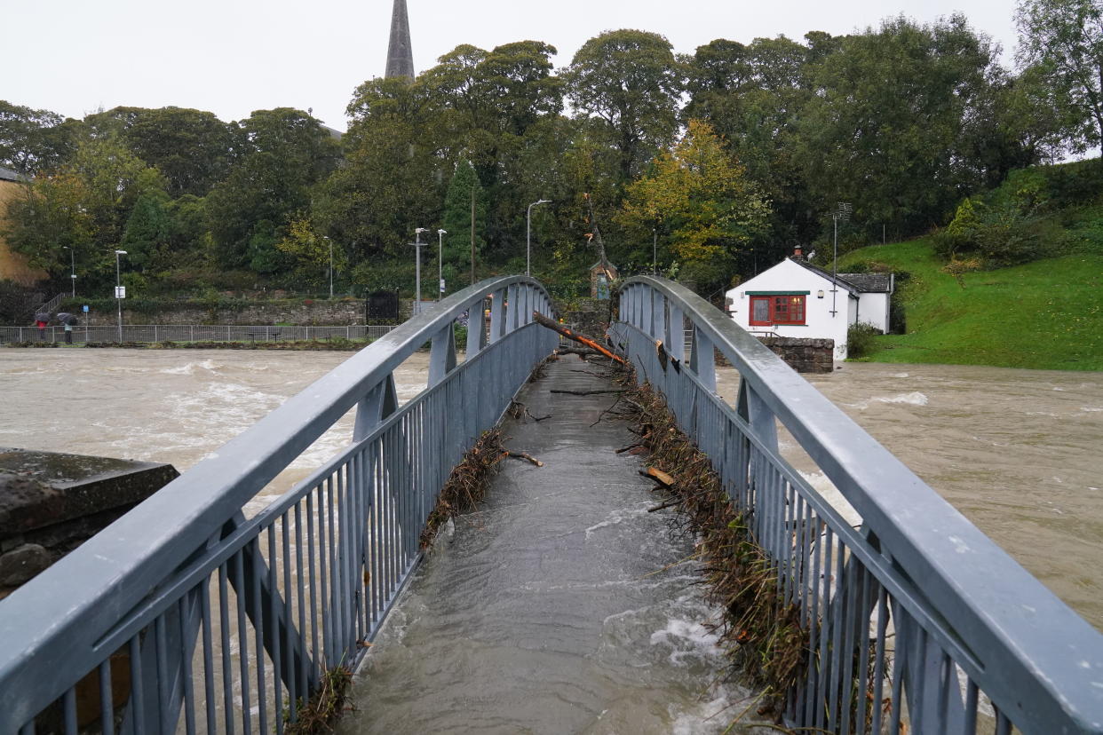 High water levels in Cockermouth, Cumbria, where the Met office has warned of life-threatening flooding and issued amber weather warnings as the area was lashed with 