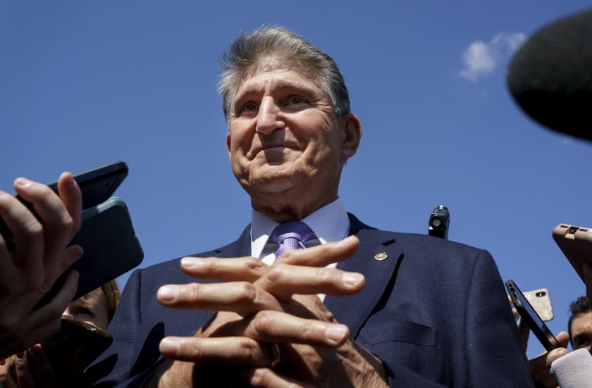 Sen. Joe Manchin, D-W.Va., a centrist Democrat vital to the fate of President Joe Biden's $3.5 government overhaul, updates reporters about his position on the bill, at the Capitol in Washington, Thursday, Sept. 30, 2021. Despite months of being courted and cajoled, Sen. Joe Manchin is still not a yes on President Joe Biden's big $2 trillion domestic package and has thrown Democrats into turmoil. (AP Photo/J. Scott Applewhite, File)