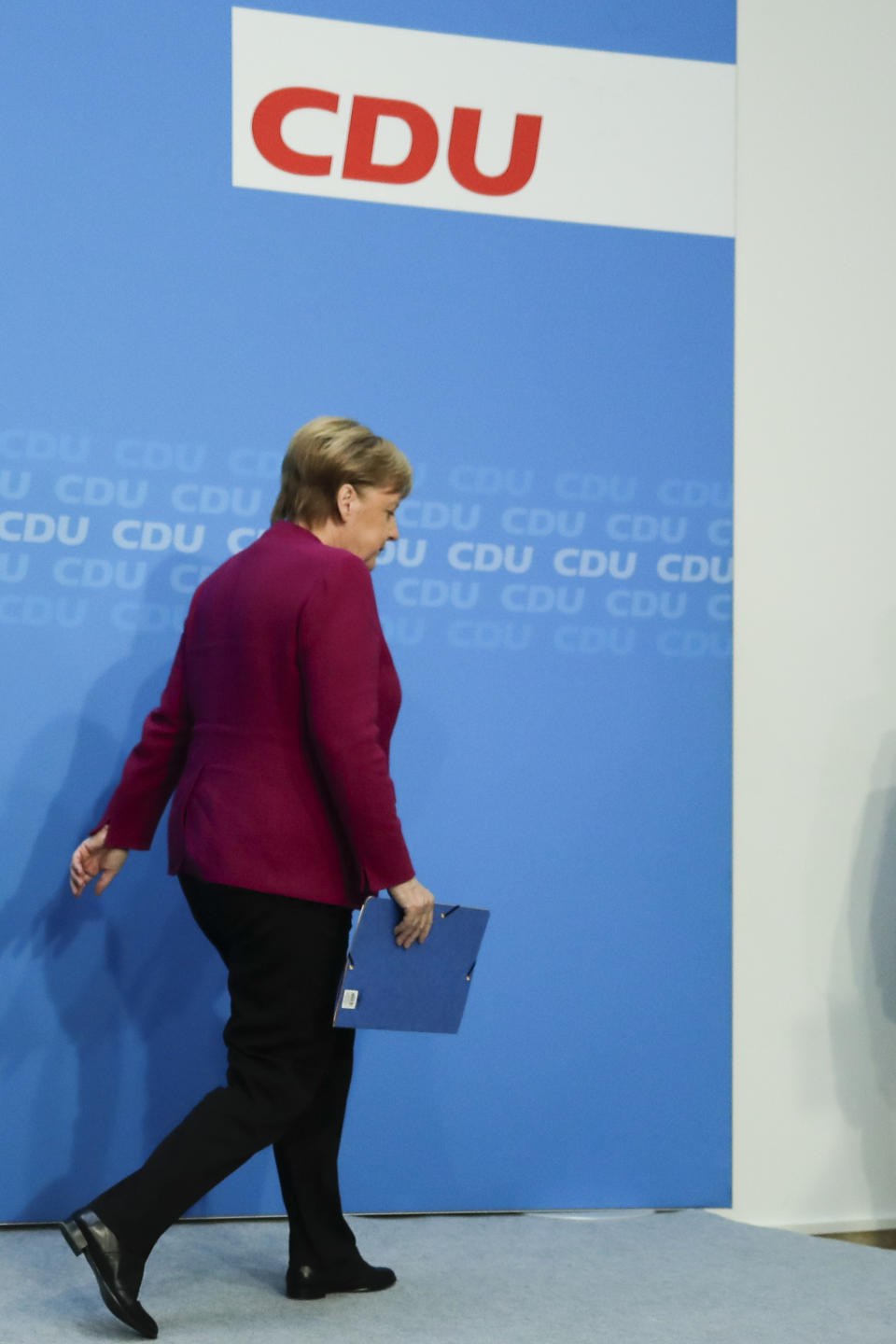 German Christian Democratic Party, CDU, chairwoman and Chancellor Angela Merkel leaves the podium after a news conference following a party's leaders meeting at the headquarters the in Berlin, Germany, Monday, Oct. 29, 2018. (AP Photo/Markus Schreiber)