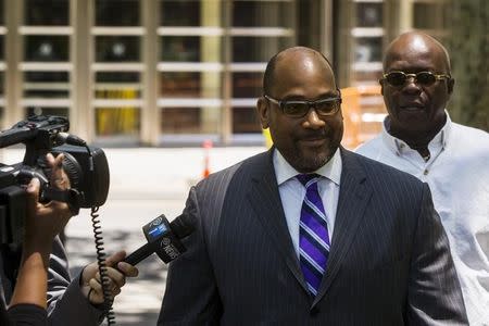 New York State Senator John Sampson (C) departs the Brooklyn Federal Courthouse in the Brooklyn borough of New York, June 22, 2015. REUTERS/Lucas Jackson